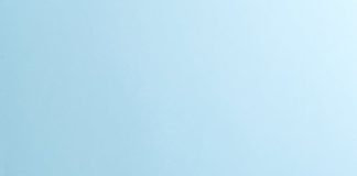 Vaccinated vs. Unvaccinated: Survey Reveals Who’s Healthier person holding syringe