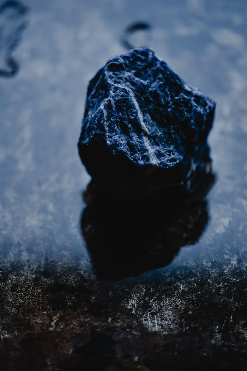 black stone on black surface