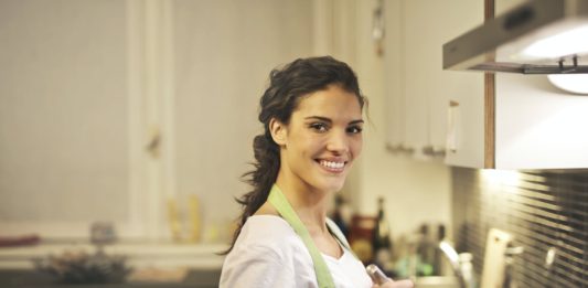 10 meals for health conscious girls delighted ethnic woman cooking in kitchen