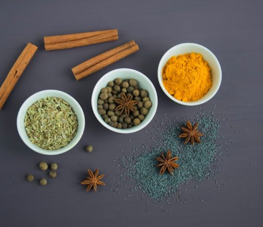 6 Magic Herbs & Spices assorted spices near white ceramic bowls