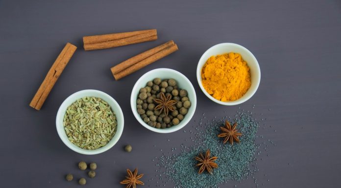 6 Magic Herbs & Spices assorted spices near white ceramic bowls