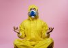 New Evidences Proves Long-Term Immunity Following COVID-19 Infection man in yellow protective suit